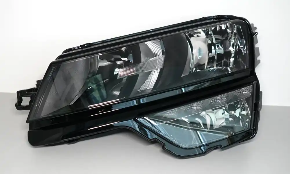 Světlomet levý přední Karoq 57B941015A - Hella Sleva