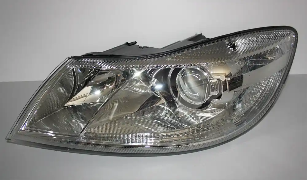Časově Omezené LP xenon světlomet D1S+H1 Škoda Octavia II facelift 1Z1941017T - Hella